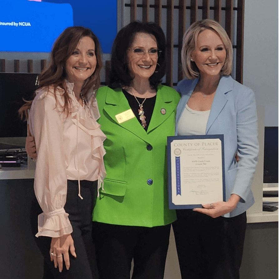 Supervisor Jones presenting Certificate of Recognition to management at Safe Credit Union in Granite Bay